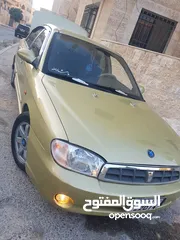  4 كيا سبكتر توماتيك اقساط دفعة 1200 دهان جديد  ماتور جديد  قير جيد  فحص مرفق  مكانيك سيارة مشية ناعمة