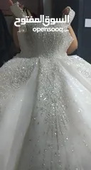  1 فستان عرس ابيض