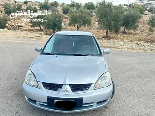  1 ميتسوبيشي لانسر 2007 ماتور 16 اتوماتيك  / وارد الكويت فحص كامل / كاش أو اقساط