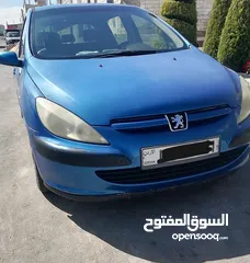  5 بيجو 307 لون ازرق موديل 2004  اطارات جديده مرخصه لغاية 28/2/2026 فحص