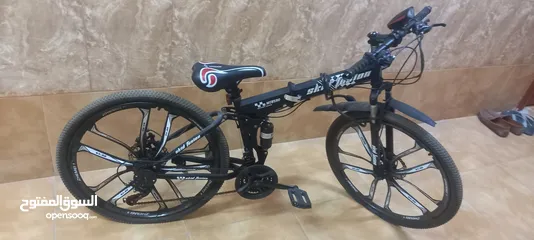  2 folding mountain bikes