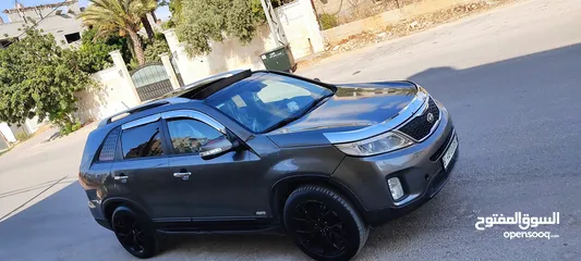  2 كيا سيرنتو 2015 بنوراما 4*4 ديزل نقدا بدل وارد منبدل