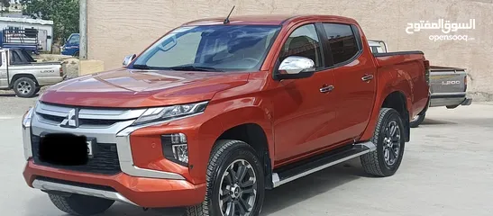  1 ميتسوبيشي سبيرتيرو L200 2021  فحص كامل (3/كاميرات) يمكن التمويل عن طريق المعرض بدفعه أولى 11000 الف