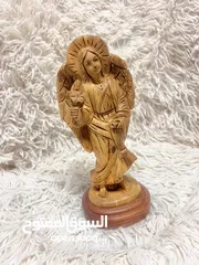  11 تماثيل خشب زيتون نحت يدوي احجام وأوزان مختلفة