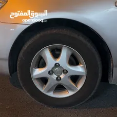  1 Toyota corolla 2006 3 rims