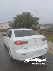  2 ميتسوبيشي لانسر. 2015 اصل برايفت   رخصة وتامين  ماطور 1600 اتومات  شامل  فتحة   اماكنية لبيع نص بنص