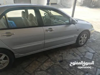  3 لانسر 2007 ماتور 1600 قير توماتيك CVT فحص خالي قص قلبان دهان جديد غرفه بيج ترخيص لشهر 24\1