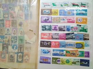  12 نيشان ملكى وزن41, 41 جرام من الدهب والفضه وعقدفضه من الاحجار الكريمه وطوابع قديمه نادره