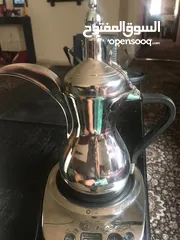  1 ماكينة تحضير وتسخين القهوه العربيه شبه جديده