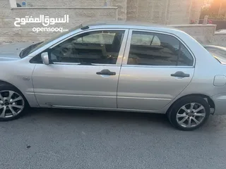  5 لانسر 2003 محول ماتور وقير 1600 موديل 2012 بحالة ممتازه مكيف شغال 100٪؜ غرفه نظيفه جلد اسود