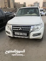  5 للبيع جيب باجيرو V6 وكاله الملا الكويت 2016 ابيض الداخل بيج فل اتوماتيك