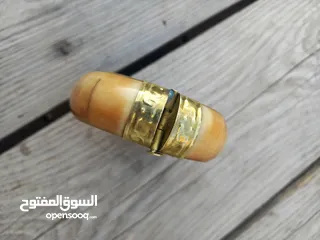  16 سواره نسائي. نحاس وحجر عقيق