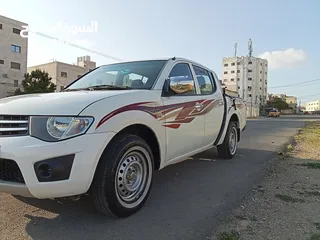  13 ميتسوبيشي L200 موديل 2015