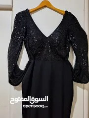  1 فستان سهرة اسود