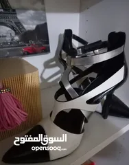  20 أحذية جديدة ونظارات شمسية أصلية دولتشي وغوتشي وشانيل وقطع فضة مميزة