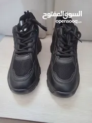  1 بوط اسود جديد