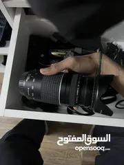  1 عدسة كانون 75-300