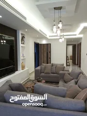  10 شقة ارضية مفروشة للايجار ثلاث غرف نوم في شارع المدينة المنورة قرب مطعم ورد
