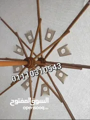  7 شمسيه عامود زان وقماش دك وقاعدة خرسانية بسعر المصنع