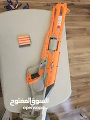  2 accustrike toy blaster with 5 bullets, 4 similar and 1 diffent