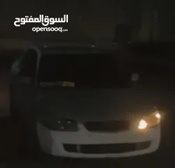  3 مازدا 323 لون بطوني