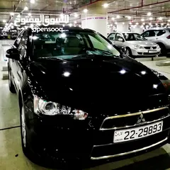  5 ميتسوبيشي لانسر EX 2016 gls اصلي وارد شركة مالك ثاني اضافات كاملة بحالة ممتازة جدا