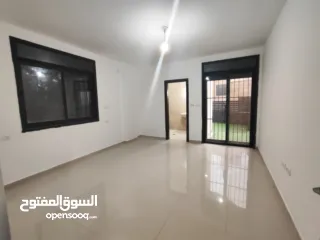  9 شقة غير مفروشة مع حديقه للايجار في عين مصباح