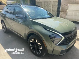  7 كيا سبورتاج X-Line AWD 2024  بانزين - فول مواصفات - حادث بسيط باب خلفي و جاملغ  ماشية اقل من 10 الاف