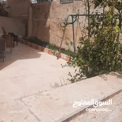  2 شقة للبيع شبه ارضي بأجمل مناطق ضاحية الرشيد