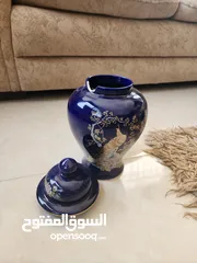  8 فاز انتيك قديمه لون ازرق رسمة طاووسين مذهبين يوجد كسر خفيف غير مؤثر على الشكل العام(نوادر)