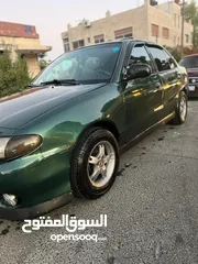  2 اكسنت 1994  خالي قص قلابان  جير عادي مرخصة 19/8/2025كوشوك جديد وجير ماتور نظيف دهان من 65٪لا 70بالمي