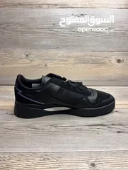  6 Adidas black shoes