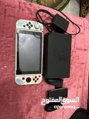  1 نينتندو سويتش مهكر نظيف كرت مع جميع توابعه فل العاب