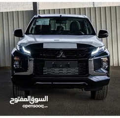  2 ميتسوبيشي L200  2023 بلاك اديشن   وارد شركة  ماشي 5 آلاف  في حالت الشركةً كفاله. فعاله في الشركة