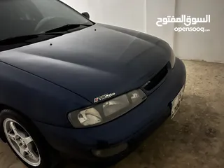  5 كيا سيفيا لون ازرق ميتالك نظيفه مع جنط 15 مميز كاوشوك وكاله غرفه نطيفه بطاريه جديده لسى كفالتها معها