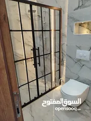  11 شقه جديده لم تسكن الجبيهه حي المنصور للايجار