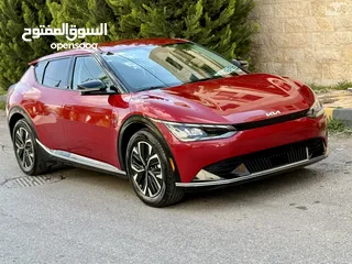  1 كيا EV 6 2022 فل وجمرك جديد ماشيه 30 الف بسعر مغري كاش واقساط بدفعه 3000 دينار
