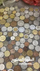  7 عملات اجنبية وطوابع قديمة