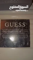  4 "ساعة يد أصلية من Guess باللون الأسود – شبه جديدة مع ضمان سنة"