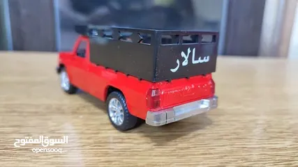  7 مجسم بكم جونيور حديد قياس 1/32 بفتح ابواب وكاله