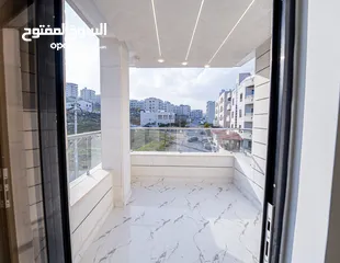  16 شقة طابق اخير مع روف مساحة 220 م مع ترس 50م بافضل مناطق شفا بدران
