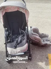  1 عرباية اطفال مع كار سيت بحالة ممتازة براند جوي