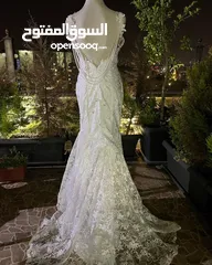  7 فستان عرس راقي موديل سمكة مع طرحة