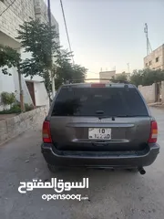  6 مواصفات جيب شروكي 1999