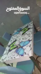  1 طاولة قزاز سكريت مع 6كراسي جلد
