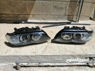  1 اضوية سيارة BMW x5+ كراسي خلفي جلد طبيعي اصلي اسود + اقزوزت خلفي عدد2 x5 2006
