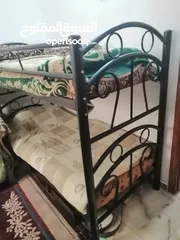  1 تخت حديد طابقين تفصيل وحديد ثقيل70دينار