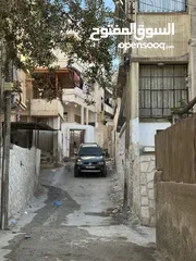  1 شقتين للبيع (أرضي + تسوية)  الزرقاء حي رمزي في منطقة حيوية جداً