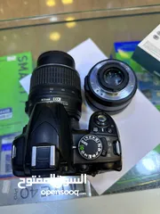  15 مع شنته وشاحن Nikon D3100 مستعمله مع عدستين