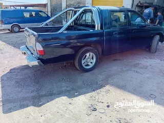  3 بكم متسوبيشي موديل 2001 مرخص لغايه 28/6/2025  دهان جديد مكانيك فحص  كوشوك جديد